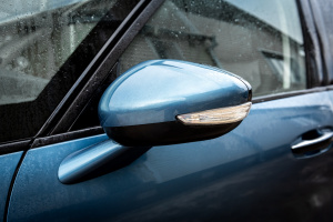 Side rear-view mirror on a modern car.